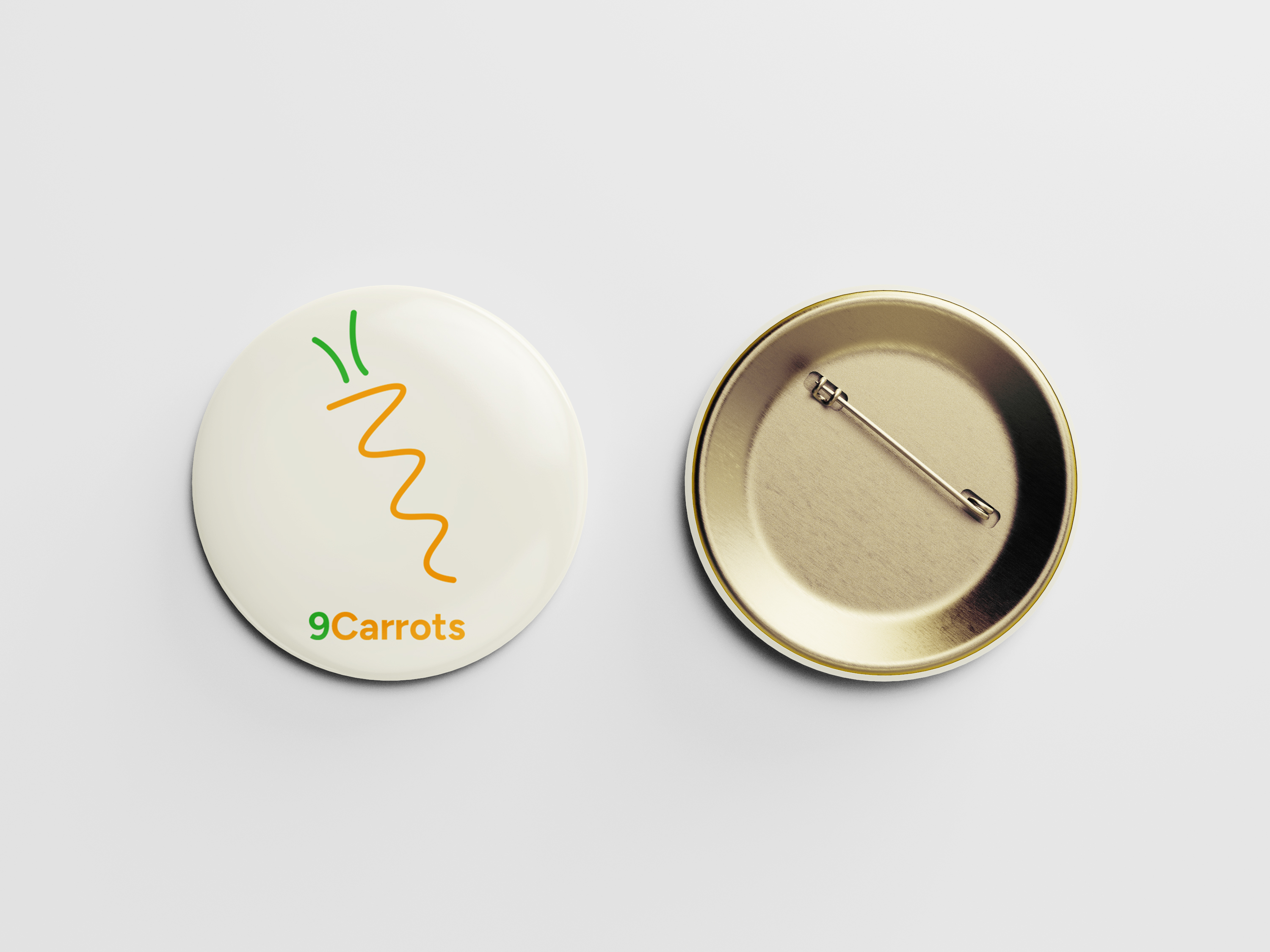 9Carrots logo mocked up onto a pin