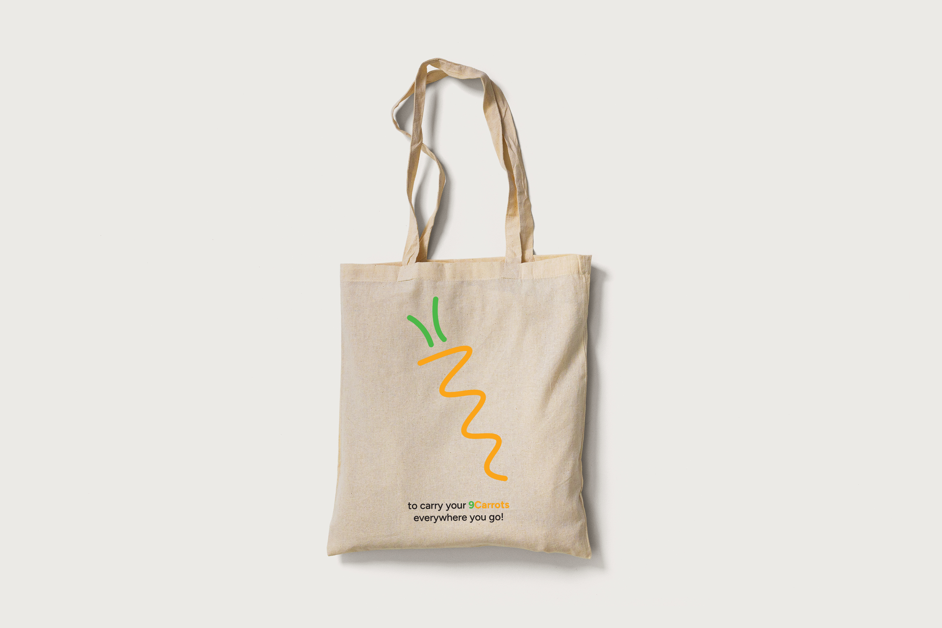 9Carrots logo on tote bag